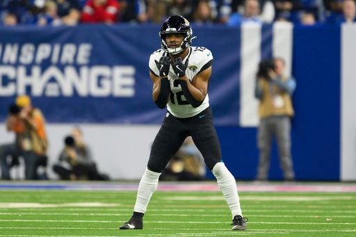 Jacksonville Jaguars wide receiver Devin Duvernay (12) prepares to return punt during an NFL football game against the Indianapolis Colts, Sunday, Jan. 5, 2025, in Indianapolis. The Colts defeated the Jaguars 26-23. (AP Photo/Zach Bolinger)