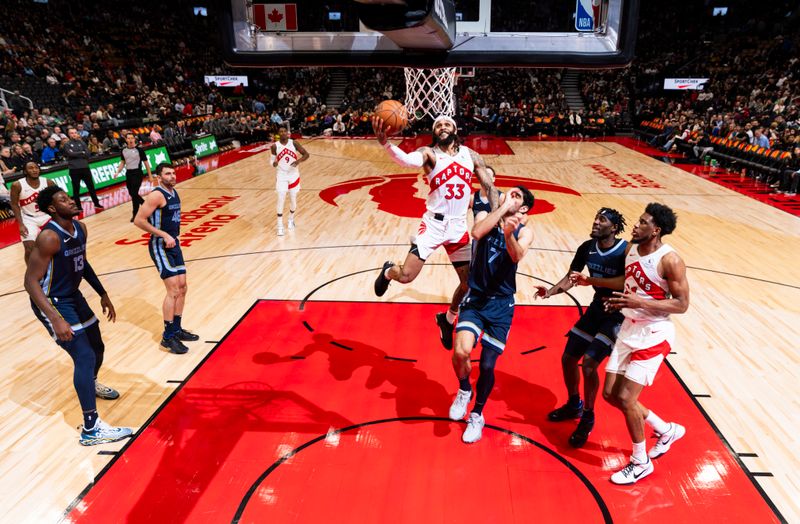 TORONTO, CANADA - JANUARY 22: Gary Trent Jr. #33 of the Toronto Raptors drives to the basket during the game against the Memphis Grizzlies on January 22, 2024 at the Scotiabank Arena in Toronto, Ontario, Canada.  NOTE TO USER: User expressly acknowledges and agrees that, by downloading and or using this Photograph, user is consenting to the terms and conditions of the Getty Images License Agreement.  Mandatory Copyright Notice: Copyright 2024 NBAE (Photo by Mark Blinch/NBAE via Getty Images)