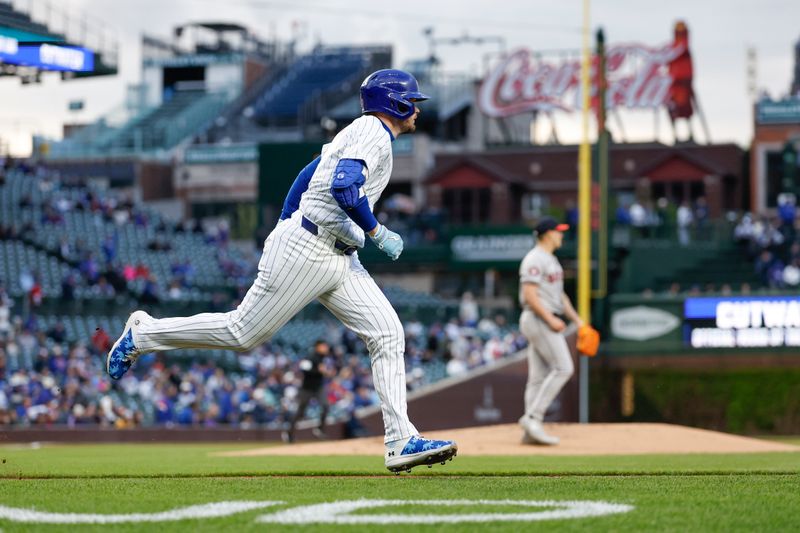 Apr 23, 2024; Chicago, Illinois, USA; Chicago Cubs outfielder Ian Happ (8) runs to second base after hitting a double against the Houston Astros during the first inning at Wrigley Field. Mandatory Credit: Kamil Krzaczynski-USA TODAY Sports