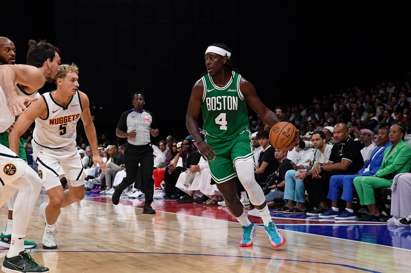 ABU DHABI, UAE - OCTOBER 4: Jrue Holiday #4 of the Boston Celtics dribbles the ball during the game against the Denver Nuggets during the 2024 Global Games on October 4, 2024 at the Etihad Arena in Abu Dhabi, United Arab Emirates. NOTE TO USER: User expressly acknowledges and agrees that, by downloading and/or using this Photograph, user is consenting to the terms and conditions of the Getty Images License Agreement. Mandatory Copyright Notice: Copyright 2024 NBAE (Photo by Brian Babineau/NBAE via Getty Images)