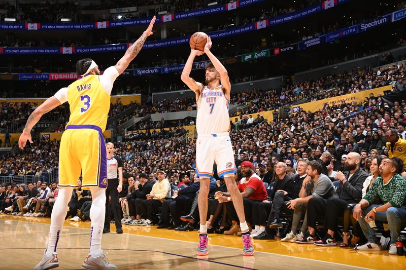 LOS ANGELES, CA - MARCH 4: Chet Holmgren #7 of the Oklahoma City Thunder shoots a three point basket during the game against the Los Angeles Lakers on March 4, 2024 at Crypto.Com Arena in Los Angeles, California. NOTE TO USER: User expressly acknowledges and agrees that, by downloading and/or using this Photograph, user is consenting to the terms and conditions of the Getty Images License Agreement. Mandatory Copyright Notice: Copyright 2024 NBAE (Photo by Andrew D. Bernstein/NBAE via Getty Images)