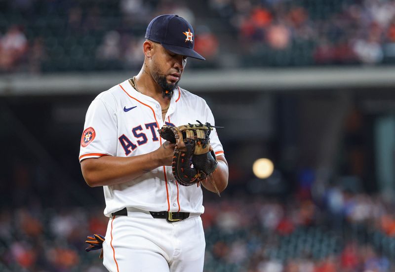 Jun 5, 2024; Houston, Texas, USA; Houston Astros first baseman Jose Abreu (79) reacts after a play during the fourth inning against the St. Louis Cardinals at Minute Maid Park. Mandatory Credit: Troy Taormina-USA TODAY Sports