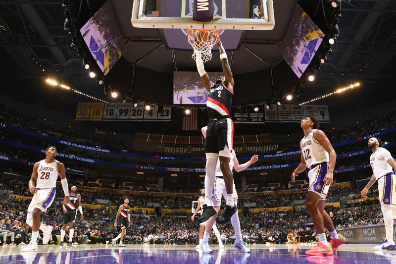 LOS ANGELES, CA - DECEMBER 8: Deandre Ayton #2 of the Portland Trail Blazers dunks the ball during the game against the Los Angeles Lakers on December 8, 2024 at Crypto.Com Arena in Los Angeles, California. NOTE TO USER: User expressly acknowledges and agrees that, by downloading and/or using this Photograph, user is consenting to the terms and conditions of the Getty Images License Agreement. Mandatory Copyright Notice: Copyright 2024 NBAE (Photo by Adam Pantozzi/NBAE via Getty Images)