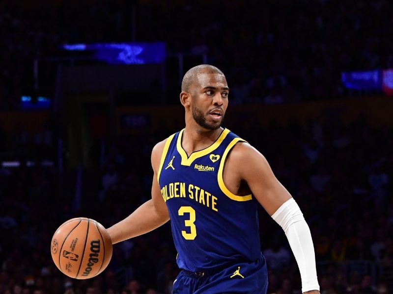 LOS ANGELES, CA - MACH 16: Chris Paul #3 of the Golden State Warriors dribbles the ball during the game against the Los Angeles Lakers on March 16, 2024 at Crypto.Com Arena in Los Angeles, California. NOTE TO USER: User expressly acknowledges and agrees that, by downloading and/or using this Photograph, user is consenting to the terms and conditions of the Getty Images License Agreement. Mandatory Copyright Notice: Copyright 2024 NBAE (Photo by Adam Pantozzi/NBAE via Getty Images)