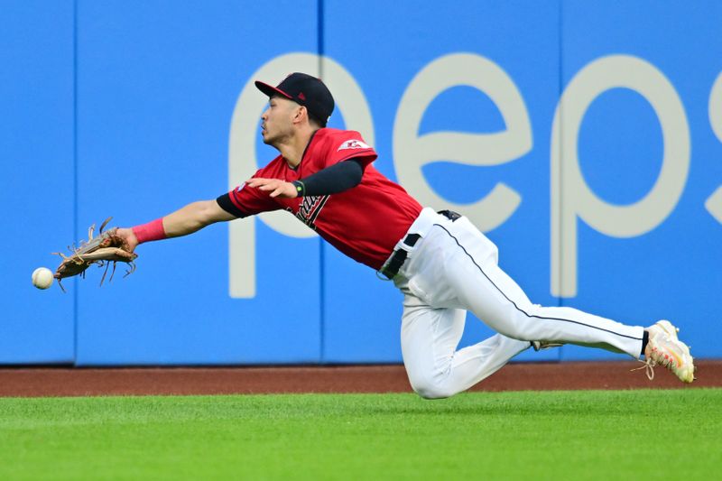 Sep 1, 2023; Cleveland, Ohio, USA; Cleveland Guardians left fielder Steven Kwan (38) cannot catch an RBI double hit by Tampa Bay Rays catcher Rene Pinto (not pictured) during the second inning at Progressive Field. Mandatory Credit: Ken Blaze-USA TODAY Sports