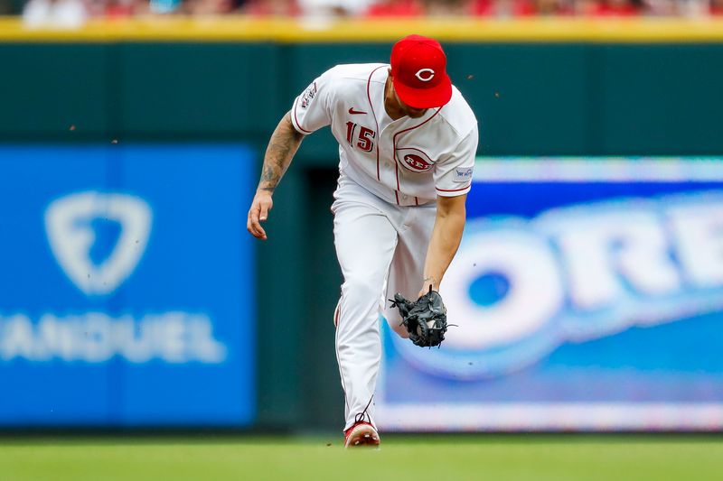 May 7, 2023; Cincinnati, Ohio, USA; Cincinnati Reds third baseman Nick Senzel (15) grounds the ball hit by Chicago White Sox shortstop Tim Anderson (not pictured) in the fifth inning at Great American Ball Park. Mandatory Credit: Katie Stratman-USA TODAY Sports