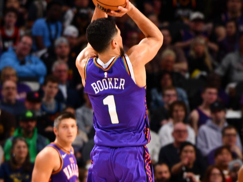 PHOENIX, AZ - JANUARY 11: Devin Booker #1 of the Phoenix Suns shoots the ball during the game against the Utah Jazz on January 11, 2025 at Footprint Center in Phoenix, Arizona. NOTE TO USER: User expressly acknowledges and agrees that, by downloading and or using this photograph, user is consenting to the terms and conditions of the Getty Images License Agreement. Mandatory Copyright Notice: Copyright 2025 NBAE (Photo by Barry Gossage/NBAE via Getty Images)