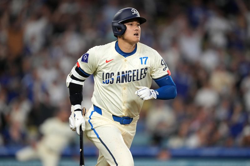 Aug 24, 2024; Los Angeles, California, USA; Los Angeles Dodgers designated hitter Shohei Ohtani (17) runs the bases after hitting a two-run home run in the fifth inning against the Tampa Bay Rays at Dodger Stadium. Mandatory Credit: Kirby Lee-USA TODAY Sports
