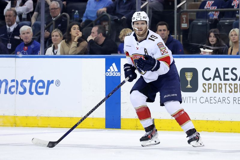 May 22, 2024; New York, New York, USA; Florida Panthers left wing Matthew Tkachuk (19) skates against the New York Rangers during the second period of game one of the Eastern Conference Final of the 2024 Stanley Cup Playoffs at Madison Square Garden. Mandatory Credit: Brad Penner-USA TODAY Sports