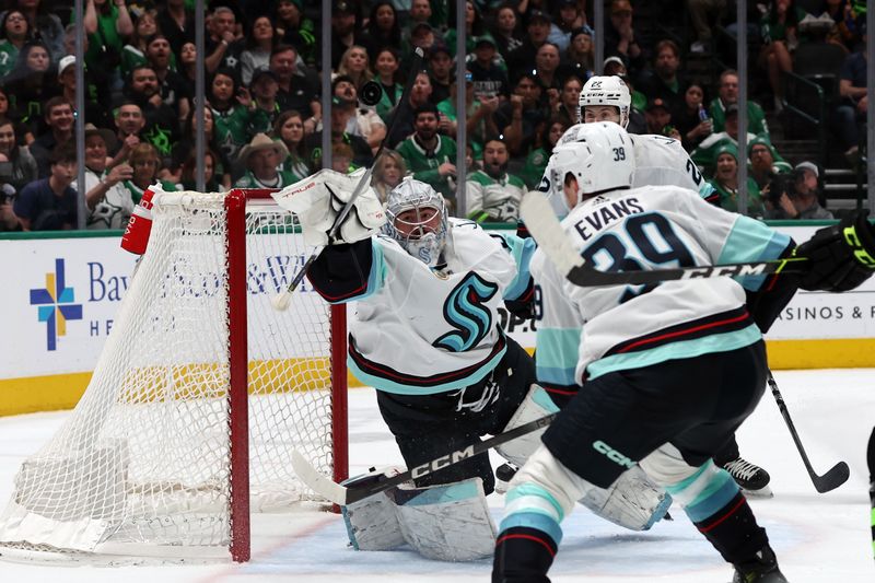 Apr 13, 2024; Dallas, Texas, USA; Seattle Kraken goaltender Philipp Grubauer (31) makes a save against the Dallas Stars in the second period at American Airlines Center. Mandatory Credit: Tim Heitman-USA TODAY Sports