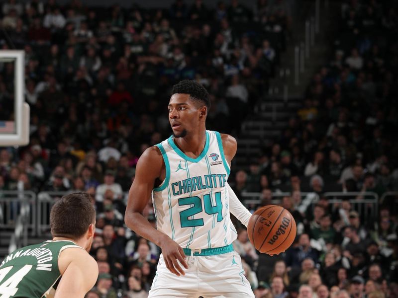 MILWAUKEE, WI - FEBRUARY 9: Brandon Miller #24 of the Charlotte Hornets handles the ball during the game against the Milwaukee Bucks on February 9, 2024 at the Fiserv Forum Center in Milwaukee, Wisconsin. NOTE TO USER: User expressly acknowledges and agrees that, by downloading and or using this Photograph, user is consenting to the terms and conditions of the Getty Images License Agreement. Mandatory Copyright Notice: Copyright 2024 NBAE (Photo by Gary Dineen/NBAE via Getty Images).