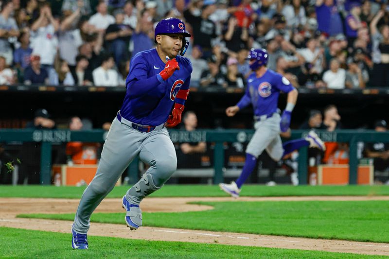 Aug 10, 2024; Chicago, Illinois, USA; Chicago Cubs catcher Miguel Amaya (9) runs after hitting a two-run single against the Chicago White Sox during the eight inning at Guaranteed Rate Field. Mandatory Credit: Kamil Krzaczynski-USA TODAY Sports