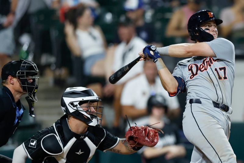 Aug 26, 2024; Chicago, Illinois, USA; Detroit Tigers second baseman Jace Jung (17) hits an RBI-single against the Chicago White Sox during the seventh inning at Guaranteed Rate Field. Mandatory Credit: Kamil Krzaczynski-USA TODAY Sports