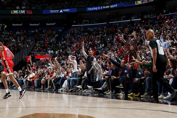 NEW ORLEANS, LA - DECEMBER 23: (EDITORS NOTE: Sequence 2 of 2) Fans celebrate a three point basket by Trey Murphy III #25 of the New Orleans Pelicans during the game against the Houston Rockets on December 23, 2023 at the Smoothie King Center in New Orleans, Louisiana. NOTE TO USER: User expressly acknowledges and agrees that, by downloading and or using this Photograph, user is consenting to the terms and conditions of the Getty Images License Agreement. Mandatory Copyright Notice: Copyright 2023 NBAE (Photo by Layne Murdoch Jr./NBAE via Getty Images)