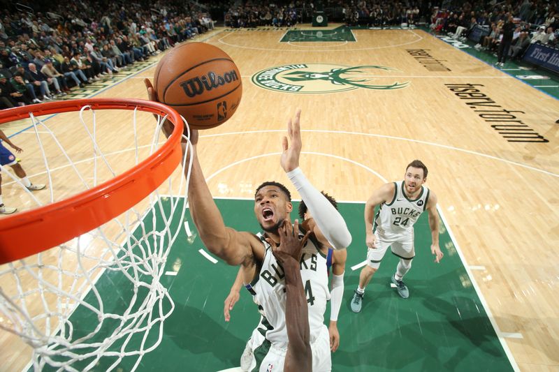 MILWAUKEE, WI - NOVEMBER 13: Giannis Antetokounmpo #34 of the Milwaukee Bucks drives to the basket during the game against the Detroit Pistons on November 13, 2024 at the Fiserv Forum Center in Milwaukee, Wisconsin. NOTE TO USER: User expressly acknowledges and agrees that, by downloading and or using this Photograph, user is consenting to the terms and conditions of the Getty Images License Agreement. Mandatory Copyright Notice: Copyright 2024 NBAE (Photo by Gary Dineen/NBAE via Getty Images).