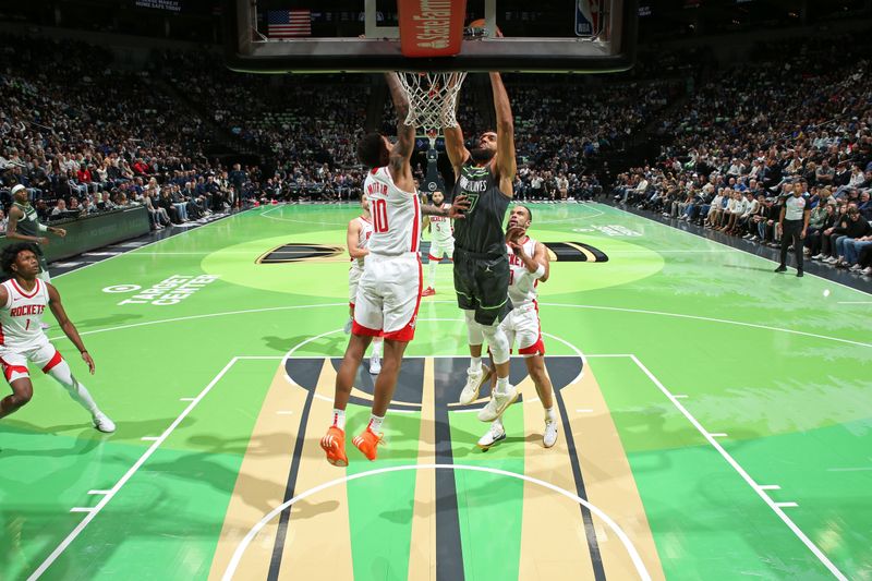 MINNEAPOLIS, MN -  NOVEMBER 26: Rudy Gobert #27 of the Minnesota Timberwolves drives to the basket during the game against the Houston Rockets during the Emirates NBA Cup game on November 26, 2024 at Target Center in Minneapolis, Minnesota. NOTE TO USER: User expressly acknowledges and agrees that, by downloading and or using this Photograph, user is consenting to the terms and conditions of the Getty Images License Agreement. Mandatory Copyright Notice: Copyright 2024 NBAE (Photo by David Sherman/NBAE via Getty Images)