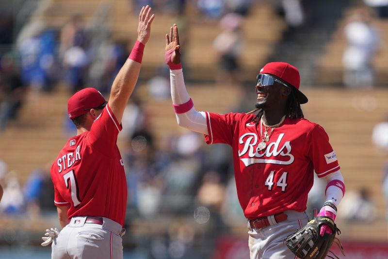 Jul 30, 2023; Los Angeles, California, USA; Cincinnati Reds third baseman Elly De La Cruz (44) celebrates with first baseman Spencer Steer (7) after a game against the Los Angeles Dodgers at Dodger Stadium. Mandatory Credit: Kirby Lee-USA TODAY Sports