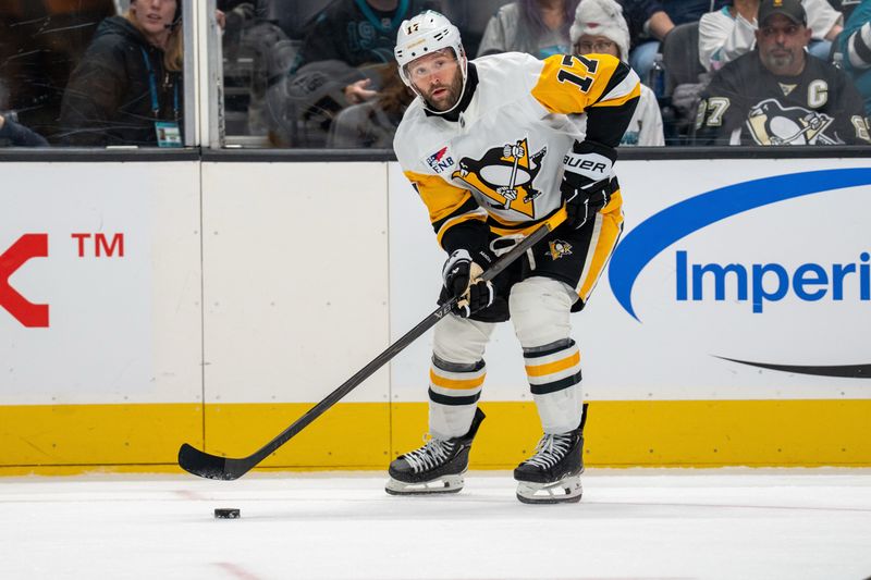 Oct 18, 2025; San Jose, California, USA; Pittsburgh Penguins right wing Bryan Rust (17) controls the puck against the San Jose Sharks during first perioid at SAP Center at San Jose. Mandatory Credit: Neville E. Guard-Imagn Images