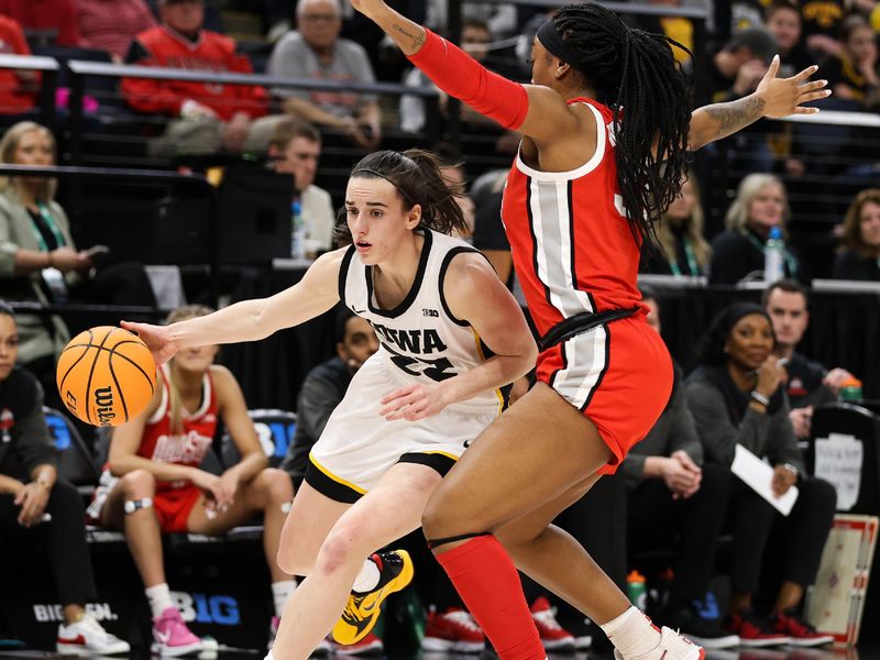 Mar 5, 2023; Minneapolis, MINN, USA; Iowa Hawkeyes guard Caitlin Clark (22) dribbles while Ohio State Buckeyes forward Cotie McMahon (32) defends during the first half at Target Center. Mandatory Credit: Matt Krohn-USA TODAY Sports