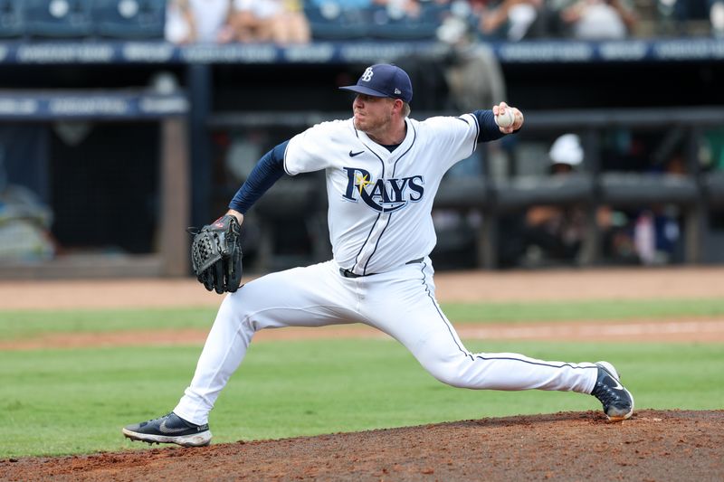 Sep 18, 2025; Tampa, Florida, USA; Tampa Bay Rays pitcher Garrett Cleavinger (60) throws a pitch against the Toronto Blue Jays in the eighth inning at George M. Steinbrenner Field. Mandatory Credit: Nathan Ray Seebeck-Imagn Images