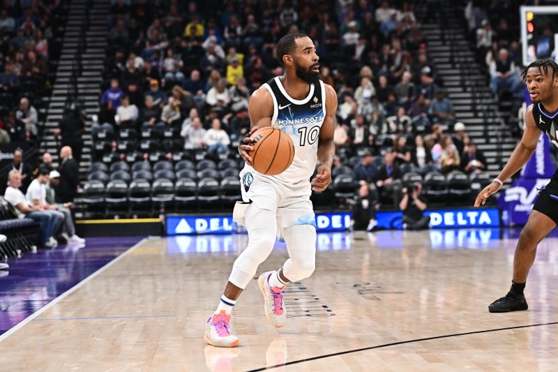 SALT LAKE CITY, UT - FEBRUARY 28:  Mike Conley #10 of the Minnesota Timberwolves dribbles the ball during the game against the Utah Jazz on February 28, 2025 at Delta Center in Salt Lake City, Utah. NOTE TO USER: User expressly acknowledges and agrees that, by downloading and or using this Photograph, User is consenting to the terms and conditions of the Getty Images License Agreement. Mandatory Copyright Notice: Copyright 2025 NBAE (Photo by Jamie Sabau/NBAE via Getty Images)