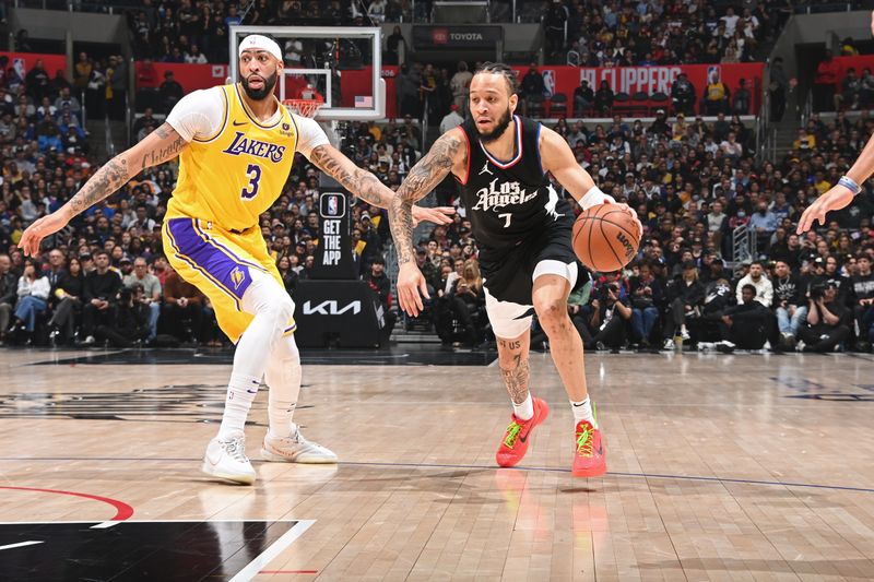 LOS ANGELES, CA - FEBRUARY 28: Amir Coffey #7 of the LA Clippers dribbles the ball during the game against the Los Angeles Lakers on February 28, 2024 at Crypto.Com Arena in Los Angeles, California. NOTE TO USER: User expressly acknowledges and agrees that, by downloading and/or using this Photograph, user is consenting to the terms and conditions of the Getty Images License Agreement. Mandatory Copyright Notice: Copyright 2024 NBAE (Photo by Andrew D. Bernstein/NBAE via Getty Images)