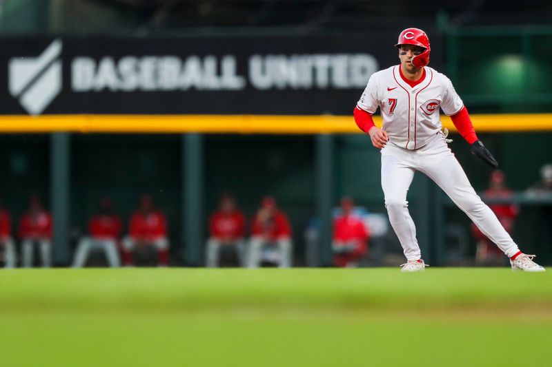 Apr 22, 2024; Cincinnati, Ohio, USA; Cincinnati Reds outfielder Spencer Steer (7) leads off from first in the fourth inning against the Philadelphia Phillies at Great American Ball Park. Mandatory Credit: Katie Stratman-USA TODAY Sports