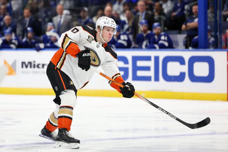 Jan 13, 2024; Tampa, Florida, USA;  Anaheim Ducks defenseman Jackson LaCombe (60) passes the puck against the Tampa Bay Lightning in the second period at Amalie Arena. Mandatory Credit: Nathan Ray Seebeck-USA TODAY Sports