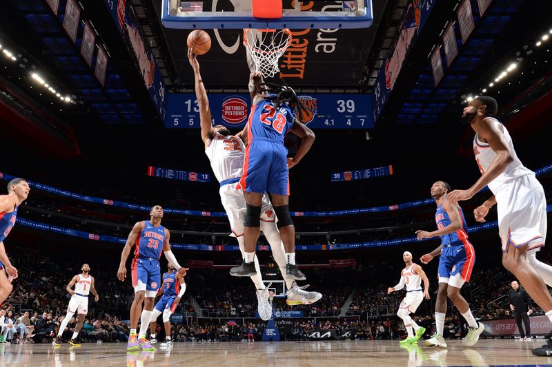 DETROIT, MI - NOVEMBER 1: Karl-Anthony Towns #32 of the New York Knicks drives to the basket during the game against the Detroit Pistons on November 1, 2024 at Little Caesars Arena in Detroit, Michigan. NOTE TO USER: User expressly acknowledges and agrees that, by downloading and/or using this photograph, User is consenting to the terms and conditions of the Getty Images License Agreement. Mandatory Copyright Notice: Copyright 2024 NBAE (Photo by Chris Schwegler/NBAE via Getty Images)