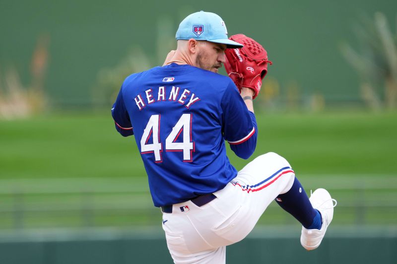 Mar 12, 2024; Surprise, Arizona, USA; Texas Rangers starting pitcher Andrew Heaney (44) pitches against the Cleveland Guardians during the first inning at Surprise Stadium. Mandatory Credit: Joe Camporeale-USA TODAY Sports