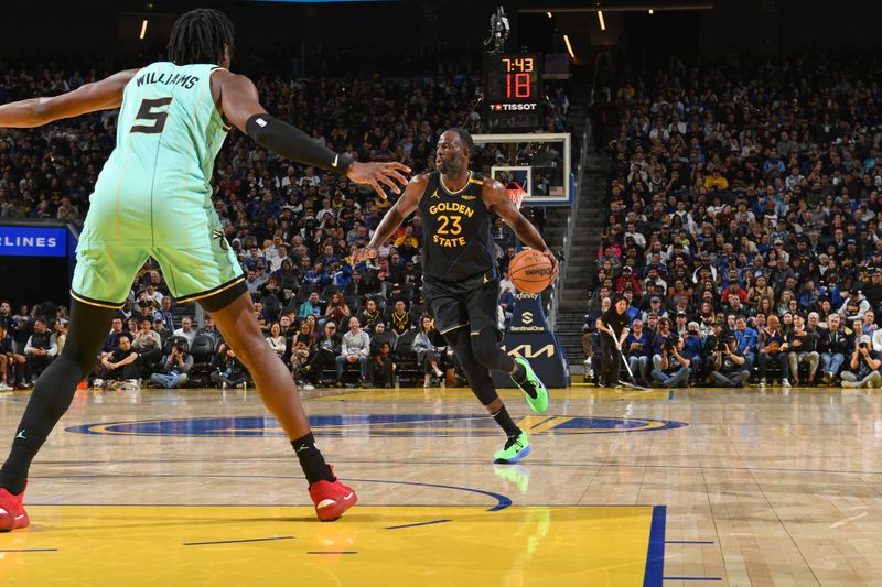 SAN FRANCISCO, CA - FEBRUARY 25: Draymond Green #23 of the Golden State Warriors dribbles the ball during the game against the Charlotte Hornets on February 25, 2025 at Chase Center in San Francisco, California. NOTE TO USER: User expressly acknowledges and agrees that, by downloading and or using this photograph, user is consenting to the terms and conditions of Getty Images License Agreement. Mandatory Copyright Notice: Copyright 2025 NBAE (Photo by Noah Graham/NBAE via Getty Images)