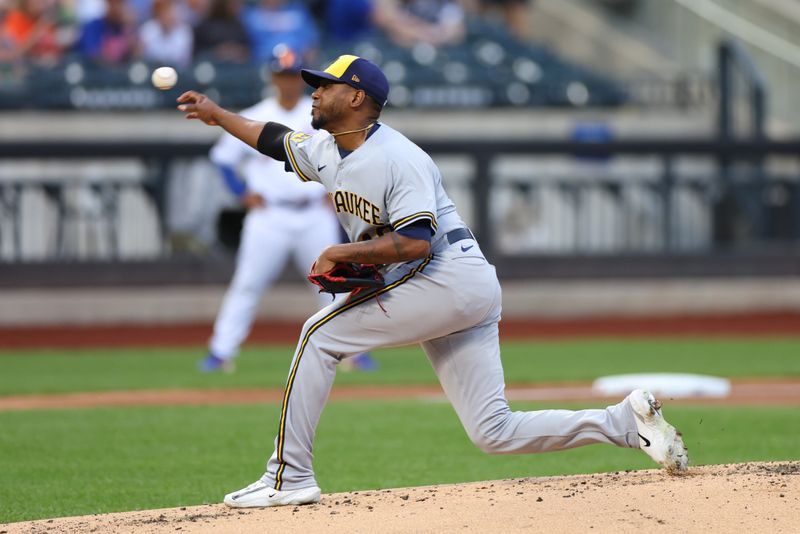 Jun 27, 2023; New York City, New York, USA; Milwaukee Brewers starting pitcher Julio Teheran (49) delivers a pitch during the first inning New York Mets at Citi Field. Mandatory Credit: Vincent Carchietta-USA TODAY Sports