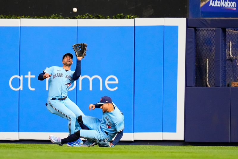 Jun 20, 2023; Miami, Florida, USA; Toronto Blue Jays center fielder Kevin Kiermaier (39) catches a fly ball against the Miami Marlins during the sixth inning at loanDepot Park. Mandatory Credit: Rich Storry-USA TODAY Sports