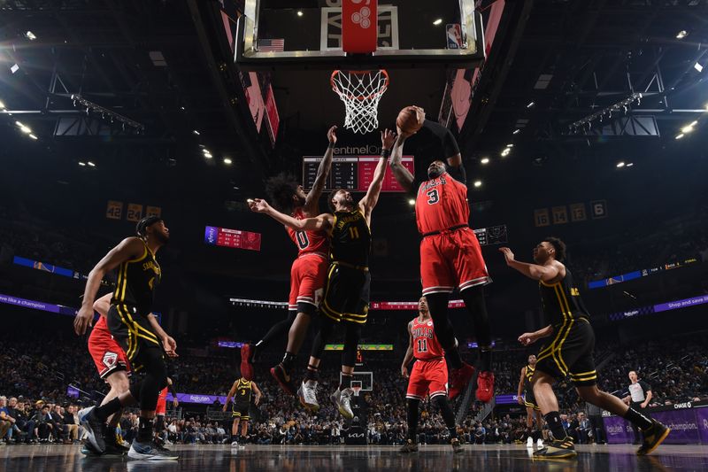 SAN FRANCISCO, CA - MARCH 7:  Andre Drummond #3 of the Chicago Bulls rebounds the ball during the game against the Golden State Warriors on March 7, 2024 at Chase Center in San Francisco, California. NOTE TO USER: User expressly acknowledges and agrees that, by downloading and or using this photograph, user is consenting to the terms and conditions of Getty Images License Agreement. Mandatory Copyright Notice: Copyright 2024 NBAE (Photo by Noah Graham/NBAE via Getty Images)