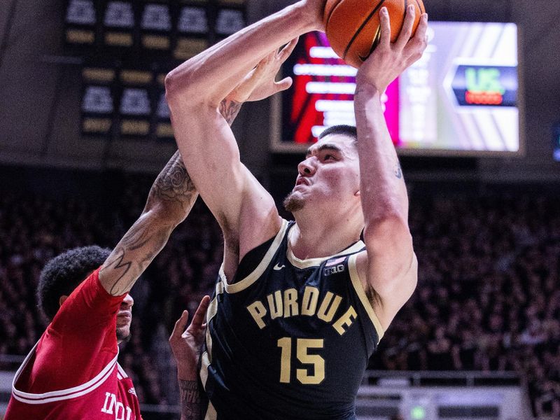 Feb 10, 2024; West Lafayette, Indiana, USA; Purdue Boilermakers center Zach Edey (15) shoots the ball while Indiana Hoosiers center Kel'el Ware (1) defends in the second half at Mackey Arena. Mandatory Credit: Trevor Ruszkowski-USA TODAY Sports