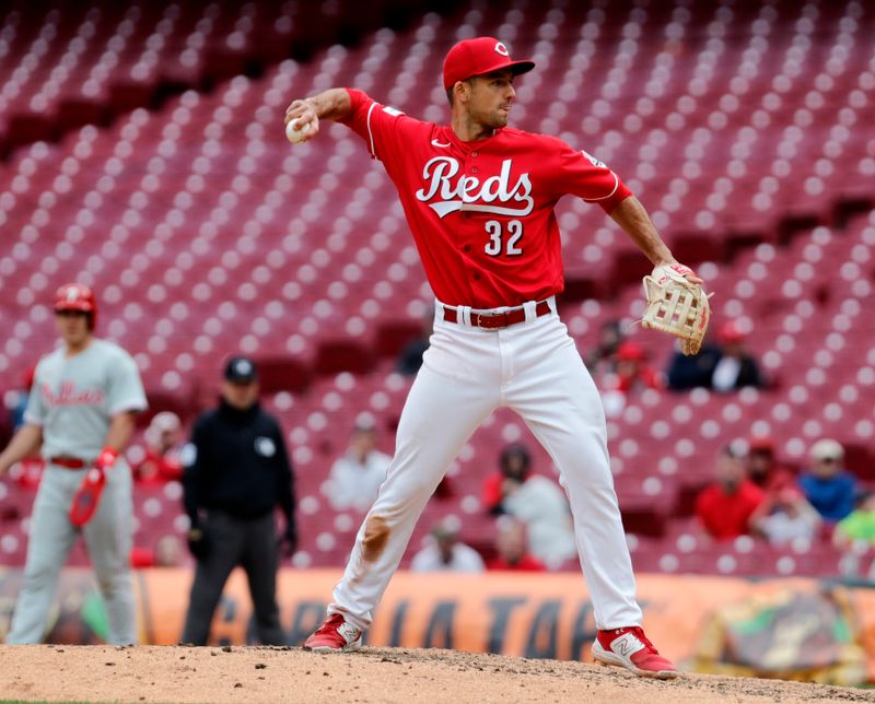 Apr 16, 2023; Cincinnati, Ohio, USA; Cincinnati Reds Jason Vosler (32) pitches against the Philadelphia Phillies during the ninth inning at Great American Ball Park. Mandatory Credit: David Kohl-USA TODAY Sports