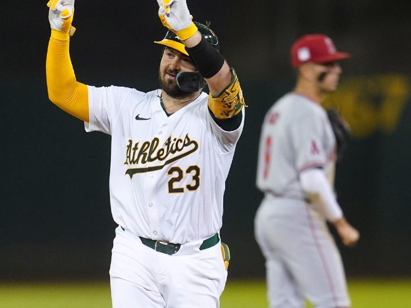 Jul 19, 2024; Oakland, California, USA; Oakland Athletics catcher Shea Laneliers (23) reacts after hitting a two-run home run against the Los Angeles Angels in the sixth inning at Oakland-Alameda County Coliseum. Mandatory Credit: Cary Edmondson-USA TODAY Sports