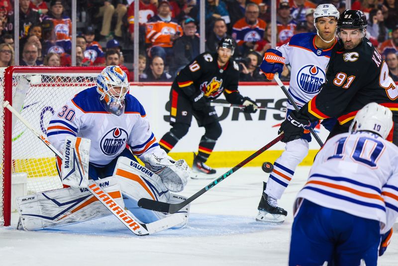 Apr 6, 2024; Calgary, Alberta, CAN; Calgary Flames center Yegor Sharangovich (not pictured) scores a goal against Edmonton Oilers goaltender Calvin Pickard (30) during the second period at Scotiabank Saddledome. Mandatory Credit: Sergei Belski-USA TODAY Sports