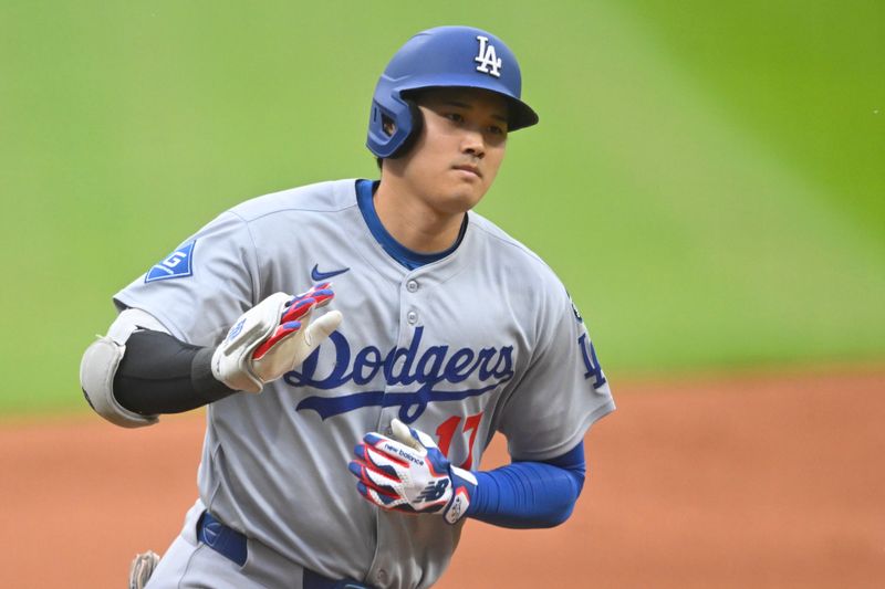 May 27, 2025; Cleveland, Ohio, USA; Los Angeles Dodgers designated hitter Shohei Ohtani (17) rounds the bases after hitting a two-run home run in the fourth inning against the Cleveland Guardians at Progressive Field. Mandatory Credit: David Richard-Imagn Images