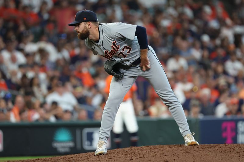 Oct 2, 2024; Houston, Texas, USA; Detroit Tigers pitcher Sean Guenther (73) throws against the Houston Astros during the eighth inning of game two of the Wildcard round for the 2024 MLB Playoffs at Minute Maid Park. Mandatory Credit: Thomas Shea-Imagn Images