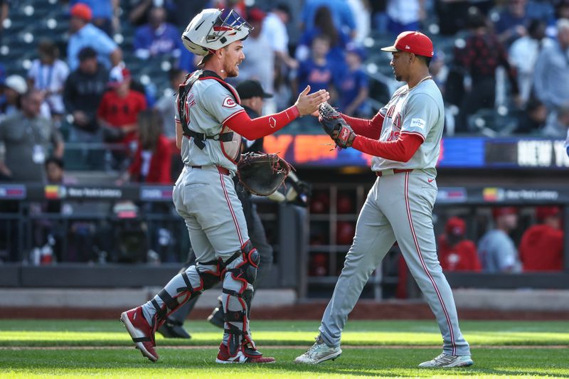 Sep 8, 2024; New York City, New York, USA;  Cincinnati Reds catcher Tyler Stephenson (37) and relief pitcher Alexis Díaz (43) celebrate after defeating the New York Mets 3-1 at Citi Field. Mandatory Credit: Wendell Cruz-Imagn Images