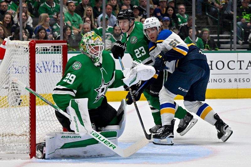 Apr 17, 2024; Dallas, Texas, USA; Dallas Stars goaltender Jake Oettinger (29) and defenseman Esa Lindell (23) and St. Louis Blues defenseman Matthew Kessel (51) look for the puck in the Stars zone during the first period at the American Airlines Center. Mandatory Credit: Jerome Miron-USA TODAY Sports