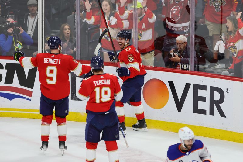 Jun 18, 2024; Sunrise, Florida, USA; Florida Panthers forward Evan Rodrigues (17) celebrates scoring against Edmonton Oilers during the second period in game five of the 2024 Stanley Cup Final at Amerant Bank Arena. Mandatory Credit: Sam Navarro-USA TODAY Sports