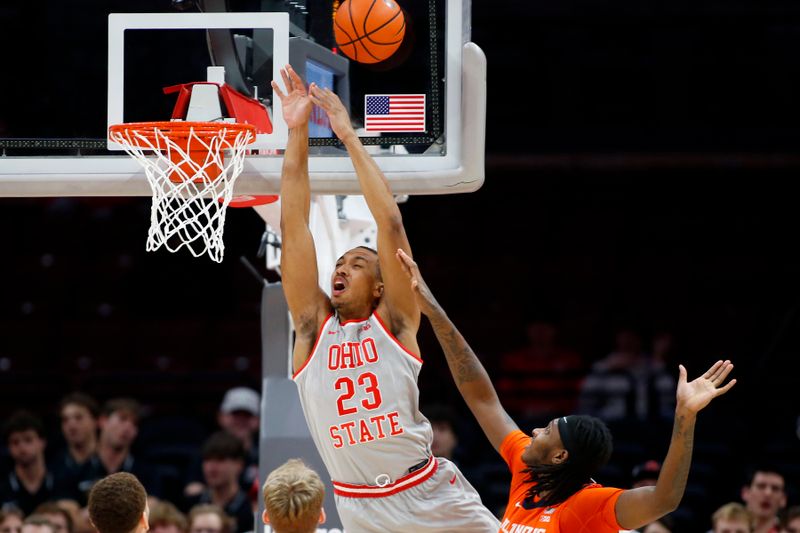 Jan 30, 2024; Columbus, Ohio, USA; Ohio State Buckeyes forward Zed Key (23) looks to score as Illinois Fighting Illini forward Dain Dainja (42) fouls on the play during the second half at Value City Arena. Mandatory Credit: Joseph Maiorana-USA TODAY Sports