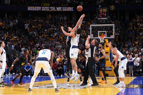 DENVER, CO - NOVEMBER 3: The opening tip off during the game between the Dallas Mavericks and the Denver Nuggets during the In-Season Tournament on November 3, 2023 at the Ball Arena in Denver, Colorado. NOTE TO USER: User expressly acknowledges and agrees that, by downloading and/or using this Photograph, user is consenting to the terms and conditions of the Getty Images License Agreement. Mandatory Copyright Notice: Copyright 2023 NBAE (Photo by Garrett Ellwood/NBAE via Getty Images)