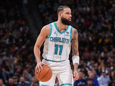 DENVER, CO - JANUARY 1: Cody Martin #11 of the Charlotte Hornets handles the ball during the game against the Denver Nuggets on January 1, 2024 at the Ball Arena in Denver, Colorado. NOTE TO USER: User expressly acknowledges and agrees that, by downloading and/or using this Photograph, user is consenting to the terms and conditions of the Getty Images License Agreement. Mandatory Copyright Notice: Copyright 2024 NBAE (Photo by Bart Young/NBAE via Getty Images)