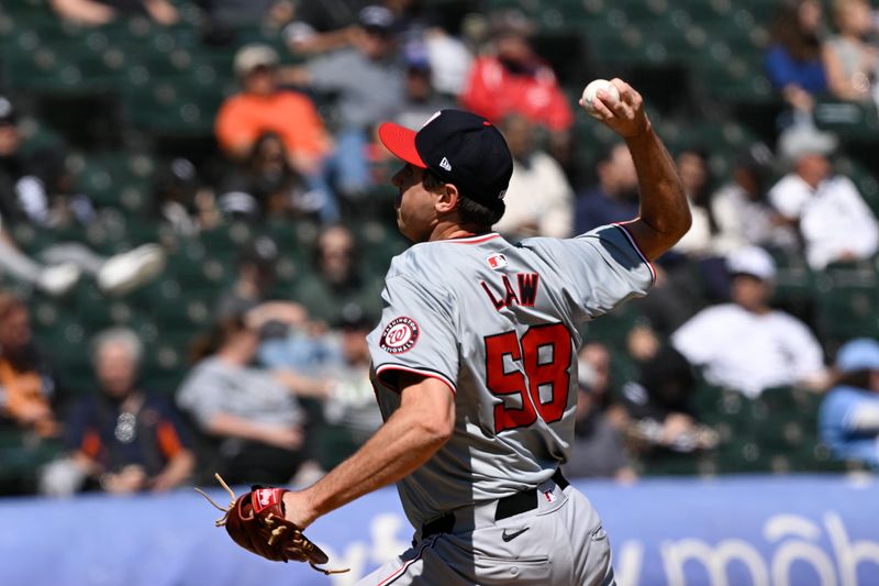 May 15, 2024; Chicago, Illinois, USA;  Washington Nationals pitcher Derek Law (58) pitches against the Chicago White Sox during the sixth inning at Guaranteed Rate Field. Mandatory Credit: Matt Marton-USA TODAY Sports