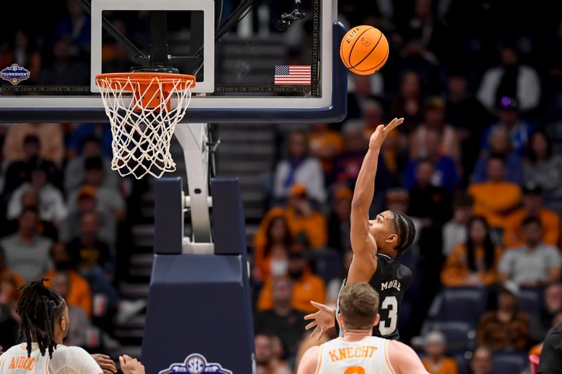 Mar 15, 2024; Nashville, TN, USA; Mississippi State Bulldogs guard Shakeel Moore (3) lays the ball up against the Tennessee Volunteers during the second half at Bridgestone Arena. Mandatory Credit: Steve Roberts-USA TODAY Sports