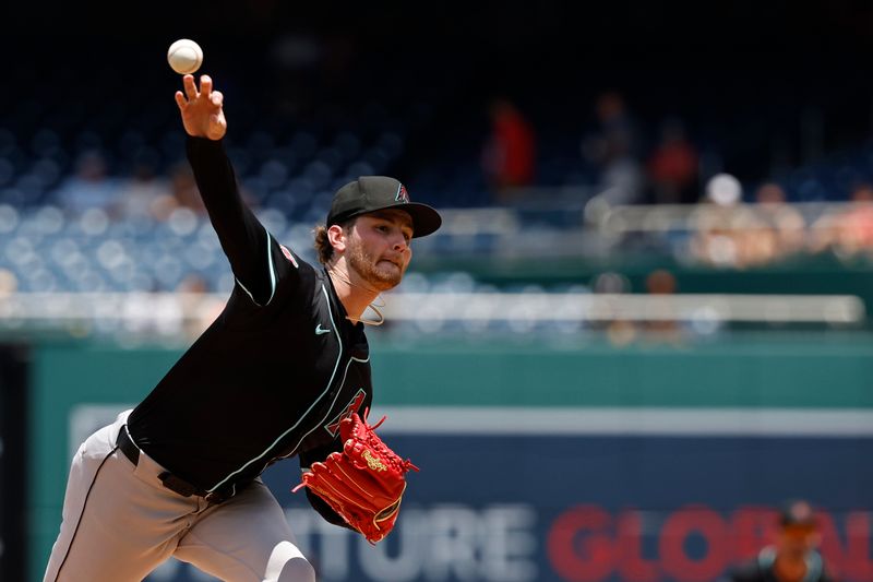 Jun 20, 2024; Washington, District of Columbia, USA; Arizona Diamondbacks starting pitcher Ryne Nelson (19) pitches against the Washington Nationals during the first inning at Nationals Park. Mandatory Credit: Geoff Burke-USA TODAY Sports