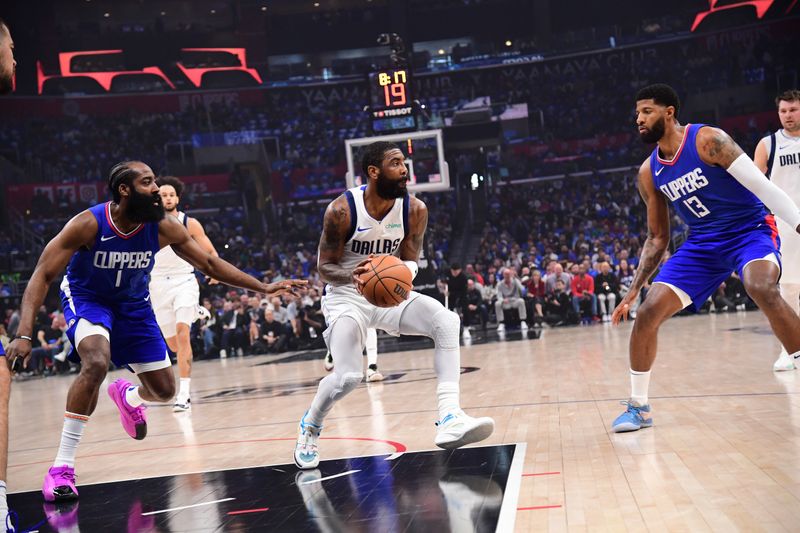 LOS ANGELES, CA - APRIL 21:  Kyrie Irving #11 of the Dallas Mavericks handles the ball during the game against the LA Clippers during Round 1 Game 1 of the 2024 NBA Playoffs on April 21, 2024 at Crypto.Com Arena in Los Angeles, California. NOTE TO USER: User expressly acknowledges and agrees that, by downloading and/or using this Photograph, user is consenting to the terms and conditions of the Getty Images License Agreement. Mandatory Copyright Notice: Copyright 2024 NBAE (Photo by Adam Pantozzi/NBAE via Getty Images)